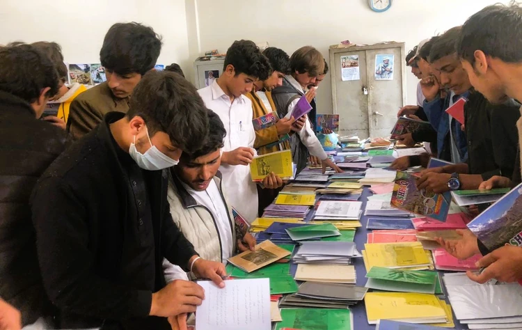 Students reading the books